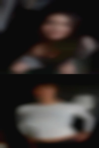 Dark swingers brown curly bars hair.